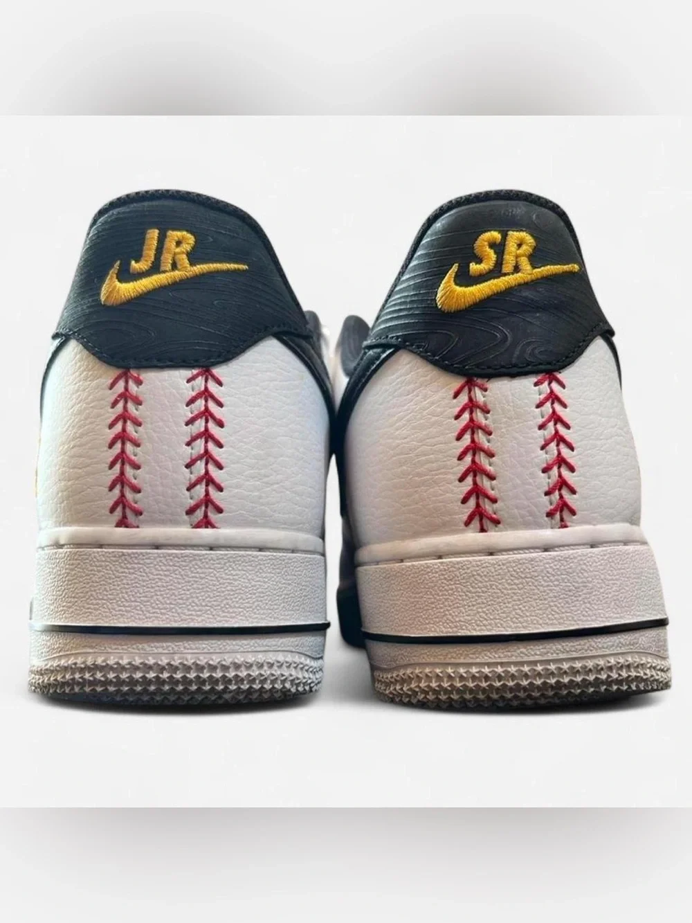 Nike White and Black Leather Sneakers with Gold Accents